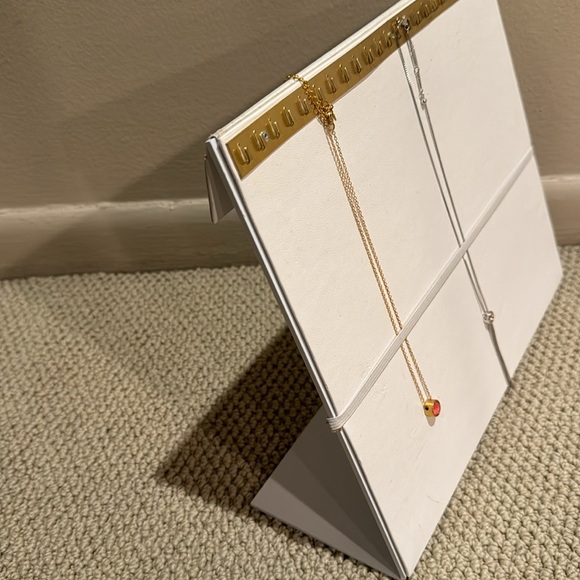 24 hook white necklace display.  Elastic strap stabilizer. - Picture 4 of 5